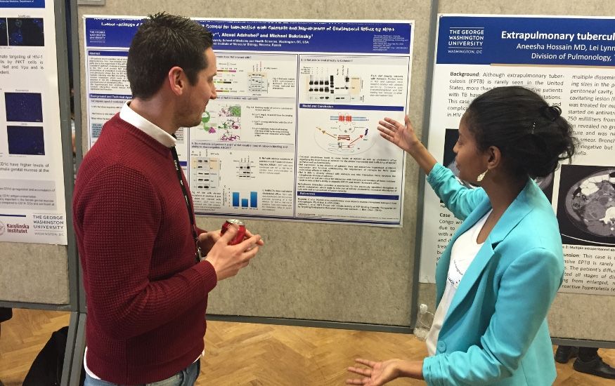MITM postdocs and students presenting posters at the GWU 2015 Research days - Ruth Hunegnaw (Bukrinsky lab) and André Raposo (Nixon lab)