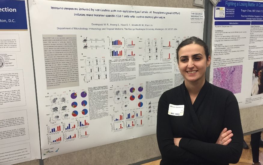 MITM postdocs and students presenting posters at the GWU 2015 Research days - Mariana Dominguez (Nixon and Khan labs)