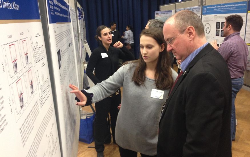 MITM postdocs and students presenting posters at the GWU 2015 Research days - Alexandra Gross with Douglas Nixon