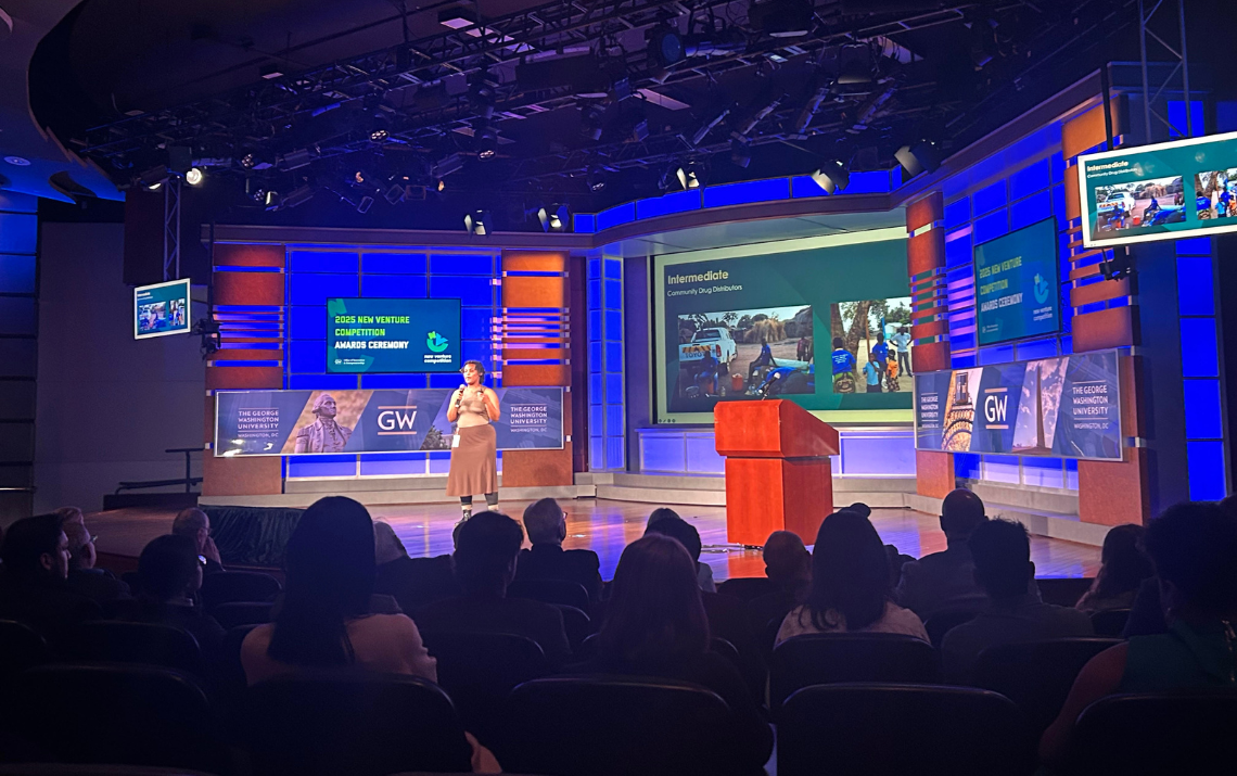 Jada Covington presenting on stage at the 17th Annual GW New Venture Competition Award Ceremony. 